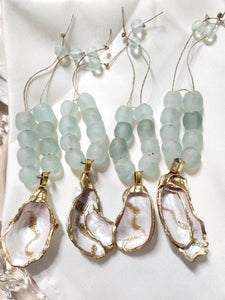 Oyster Shell Napkin Glass Bead Rings - Metallic Pearl/White/Gold w/Clear Aqua Glass Beads