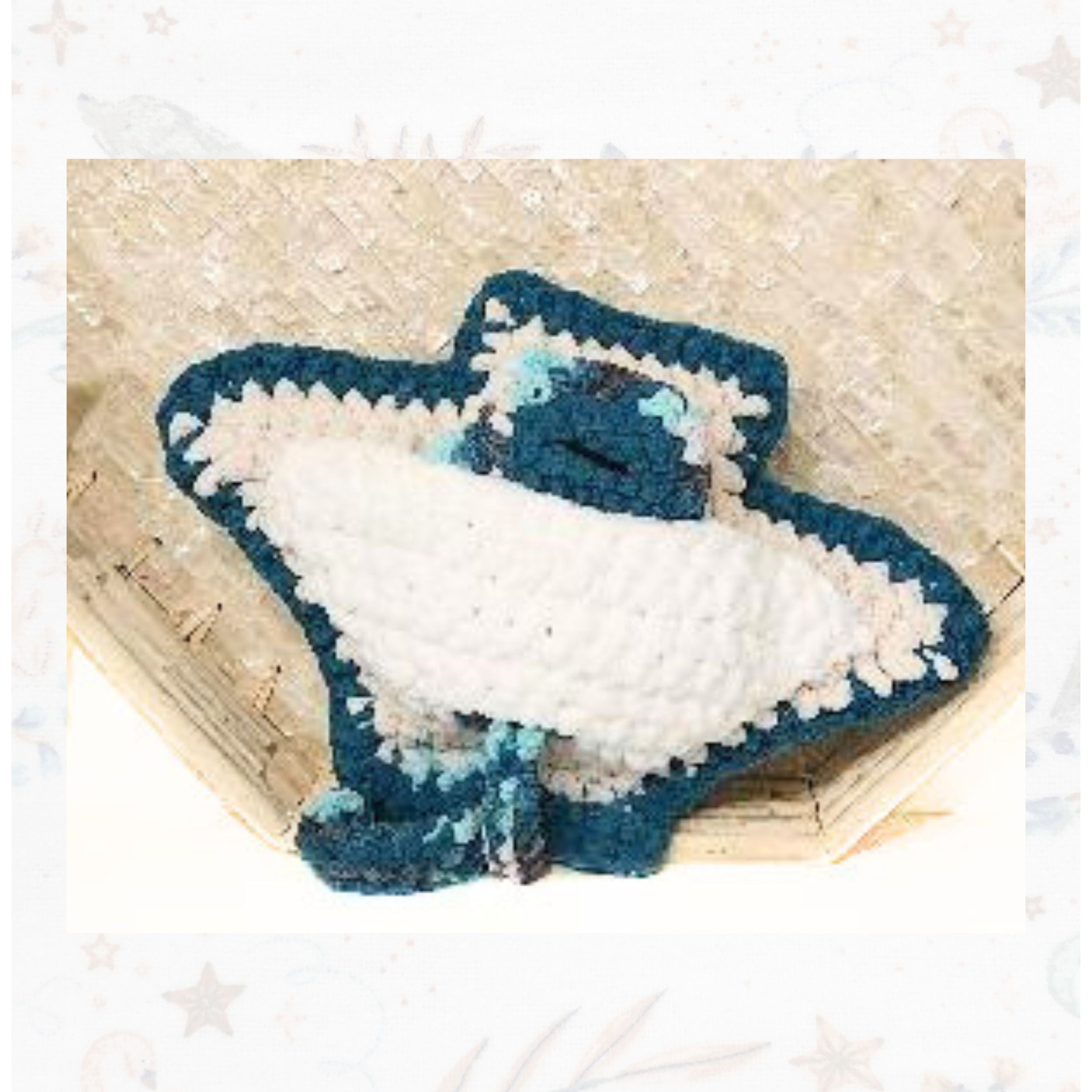 The underneath view of the Seraphina and Sol signature stingray set, showing the clean artisan crochet stitching and the baby ray nestled against the mother's belly, by Coastline Boutique