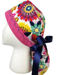 Vibrant multi-color floral surgical cap with a fuchsia designer-stitched headband by Coastline Boutique