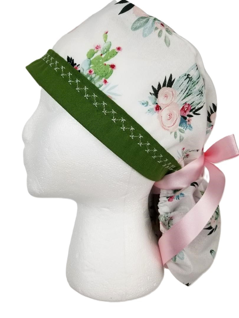 Southwestern cactus and pink floral surgical cap with an olive green designer-stitched headband by Coastline Boutique