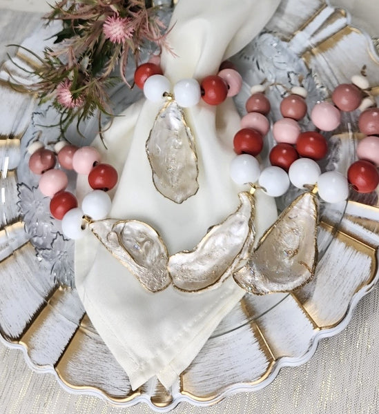 Oyster Shell Shades of Pink Wood Bead Napkin Rings - Pearl Champagne Gold